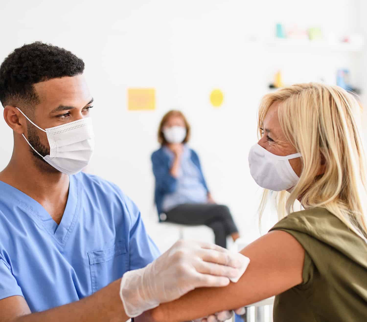 woman receiving a vaccine shot